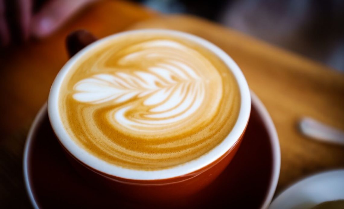 hot milk foam in coffee cup